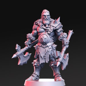 May include: A grey plastic miniature figurine of a warrior with a beard and a fur-lined cloak, holding two axes. The warrior is wearing armour and a kilt.