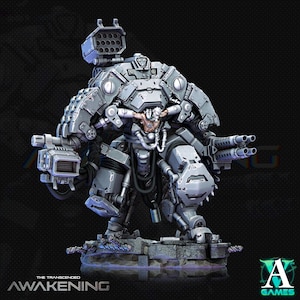 May include: A detailed, gray-toned miniature of a futuristic mech warrior, heavily armored and armed with multiple missile launchers and cannons. The figure stands on a stone base, with the text "THE TRANSCENDED AWAKENING" and a logo visible.