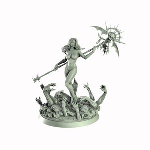 May include: A gray, detailed miniature figurine of a woman standing on a base of skeletal hands. She is holding a staff with a skull and wings at the top.