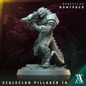 May include: A gray, detailed miniature figure of a reptilian humanoid soldier holding a futuristic rifle. The figure is part of the "Scaleclad Huntpack" and is labeled "Scaleclad Pillager 10". The figure is on a round base.