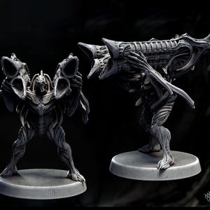 May include: A detailed, gray, plastic figurine of a creature with multiple arms and a large, segmented head. The creature is standing on a round base.