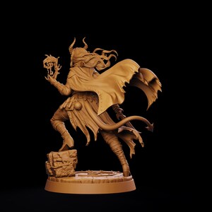 May include: A monochromatic tan miniature figurine of a horned character with long flowing hair, wearing a tattered cloak and armor. The figure holds a key-shaped object in one hand, features a long tail, and stands on a circular stone base.