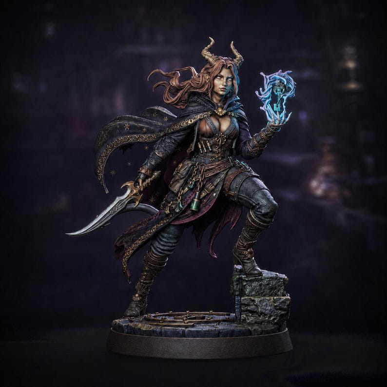 May include: A detailed fantasy figurine of a horned character with long hair, wearing a dark cloak and leather armor. The figure holds a curved blade in one hand and a glowing blue magical energy effect with a key in the other, standing on a stone base.
