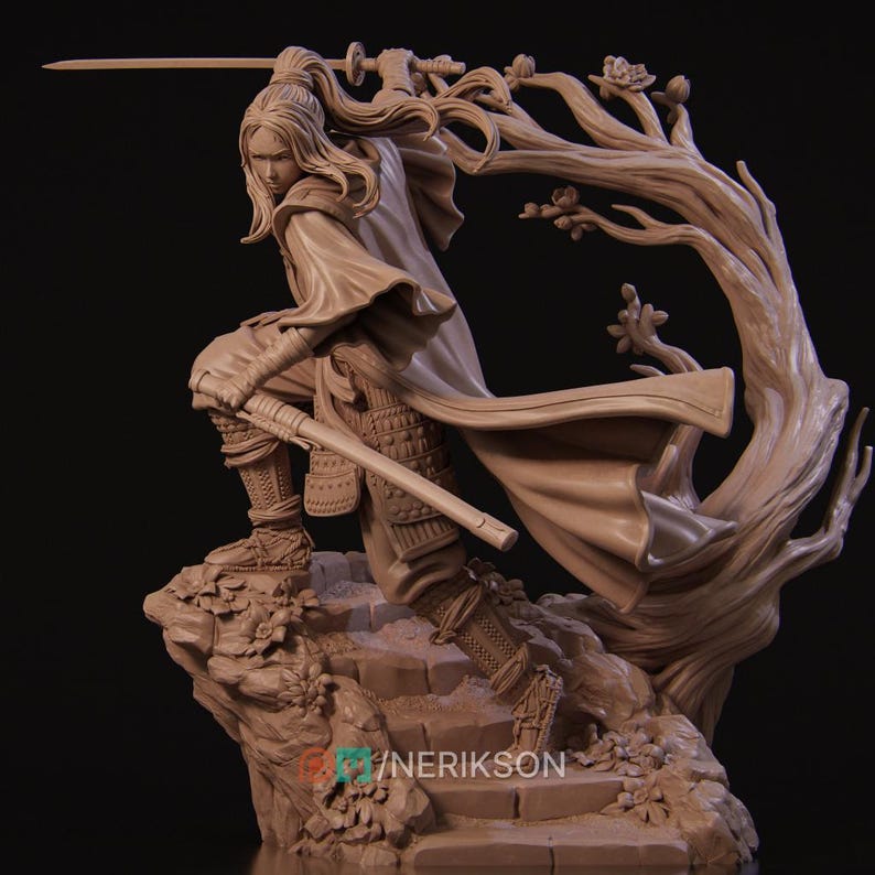 May include: A detailed sculpture of a warrior in a dynamic pose, holding a sword. The figure is clad in armor and a flowing cape, with long hair. The sculpture is set against a backdrop of a stylized tree and rocky terrain. The sculpture is a light brown color.