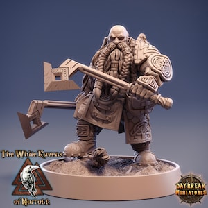May include: A detailed miniature figurine of a dwarf warrior with a long braided beard, wearing armour and wielding two axes. The figurine is painted in a light brown colour and is standing on a circular base.