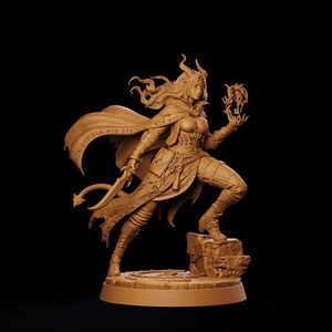 May include: A monochromatic tan miniature figurine of a horned character with long flowing hair, wearing a cloak and armor. The figure holds a curved blade in one hand and a magical orb in the other, standing on a stone base with a tail visible.