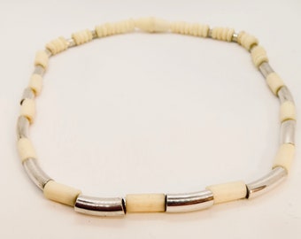 N49 Necklace of bone beads and silver tube on stretchy cord