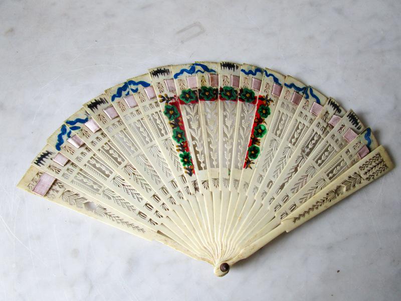 Antique fan with decorated bone ribs