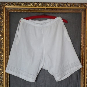 Old cotton petticoat pants. Victorian style trousers with crochet lace. Provencal style.