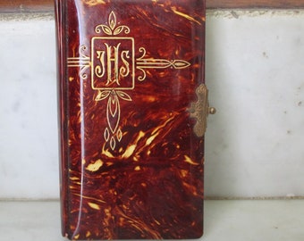 Antique Little Missal with religious art.