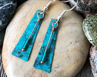 Handmade copper dangle earrings; turquoise patina with glass beads and sterling silver ear wires