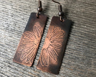 Etched copper earrings with daisy design; dangle earrings