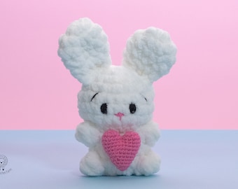 Amigurumi Bunny holding a heart crochet pattern (low-sew)