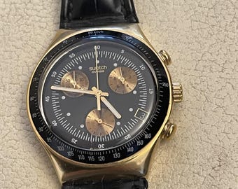Swatch 007 コラボ時計　Goldfinger SWATCH 007 JAMES BOND GOLD FINGER | eBay