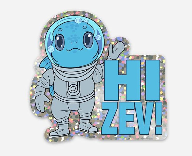 May include: A sticker featuring a blue cartoon character in a spacesuit with a bubble helmet. The character is waving, and the words "HI ZEV!" are in blue block letters. The sticker has a glittery, iridescent border.