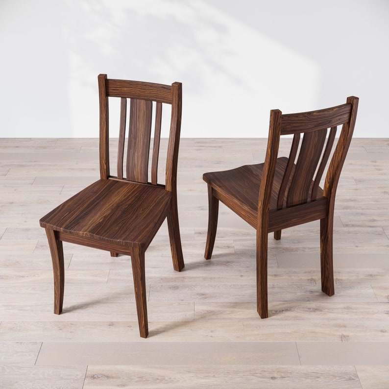 May include: Two dark brown wooden chairs with a slatted back and curved legs. The chairs are facing each other on a light wood floor.