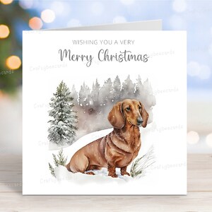 Carte de Noël teckel (rouge aux cheveux lisses), carte de voeux de chien « Joyeux Noël », scène d'hiver festive, 6 x 6 po