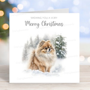 Carte de Noël de Poméranie, belle carte de voeux festive de chien « Joyeux Noël », scène de neige d'hiver amusante, 6 x 6 po, blanc à l'intérieur
