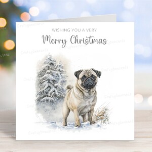 Tarjeta navideña de Pug, encantadora tarjeta de felicitación navideña con un perro, divertida escena de nieve invernal, 15 x 15 cm, interior en blanco