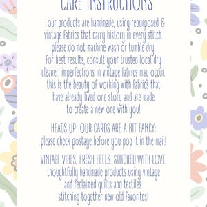 May include: A white card with blue text that reads "CARE INSTRUCTIONS" and product care details. The card also includes the text "VINTAGE VIBES. FRESH FEELS. STITCHED WITH LOVE." and the website address "denimandspring.etsy.com". The background has a floral pattern.