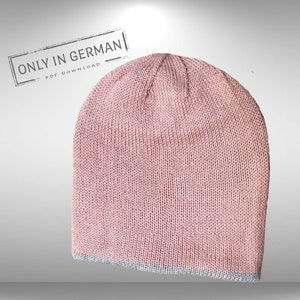 Könnte beinhalten: Eine rosafarbene Strickmütze mit grauem Rand. Die Mütze ist aus einem weichen, bequemen Material gefertigt und perfekt, um den Kopf im Winter warm zu halten.