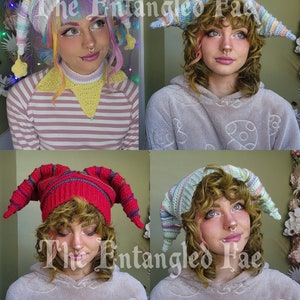 May include: A collection of four colorful crochet jester hats. Each hat features a unique color scheme, including pastel rainbow, red, and mint green. The hats have long, pointed tips and are displayed on a person.