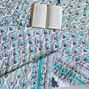 Handmade Queen floral quilted blanket in 100% cotton. Beautiful hand block print bedspread, perfect for adding charm to your space.Halloween