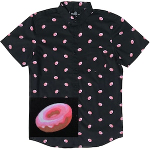 May include: A black short-sleeved button-down shirt with a pink donut pattern. The shirt has a pocket on the left side and a single donut in the pocket.