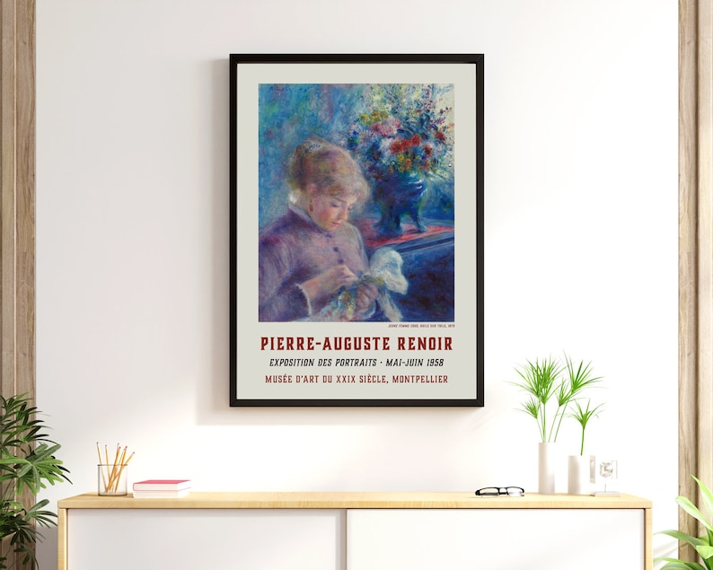May include: A vintage poster advertising an exhibition of portraits by Pierre-Auguste Renoir. The poster features a painting of a woman in a purple dress, holding a white flower. The text on the poster reads "Pierre-Auguste Renoir, Exposition des Portraits, Mai-Juin 1958, Mus&eacute;e d'Art du XXIX Si&egrave;cle, Montpellier."