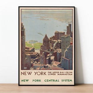 May include: Vintage travel poster featuring an aerial view of New York City with the text "New York, The Upper Bay from Lower Manhattan, New York Central System". The poster depicts a cityscape with skyscrapers and a body of water in the background.
