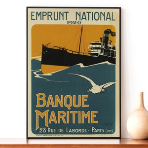 May include: A vintage poster advertising Banque Maritime, a French bank, with the text "Emprunt National 1920" and "Banque Maritime 28 Rue de Laborde - Paris (VIII)". The poster features a black and white illustration of a ship sailing on a blue sea with a white seagull flying overhead.