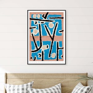 May include: Abstract art print featuring a blue and pink background with black lines and white circles. The print has the text "Paul Klee Paintings 1928-40 Institut Bernhardt 2.1.1.68-12.14.68 Tue-Sat 10-12 hrs".