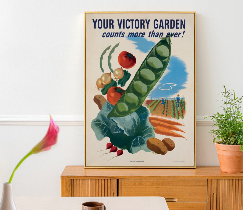 May include: A vintage poster with a green pea pod filled with peas and other vegetables, including tomatoes, onions, and cabbage. The poster has the text "YOUR VICTORY GARDEN counts more than ever!" in blue letters.