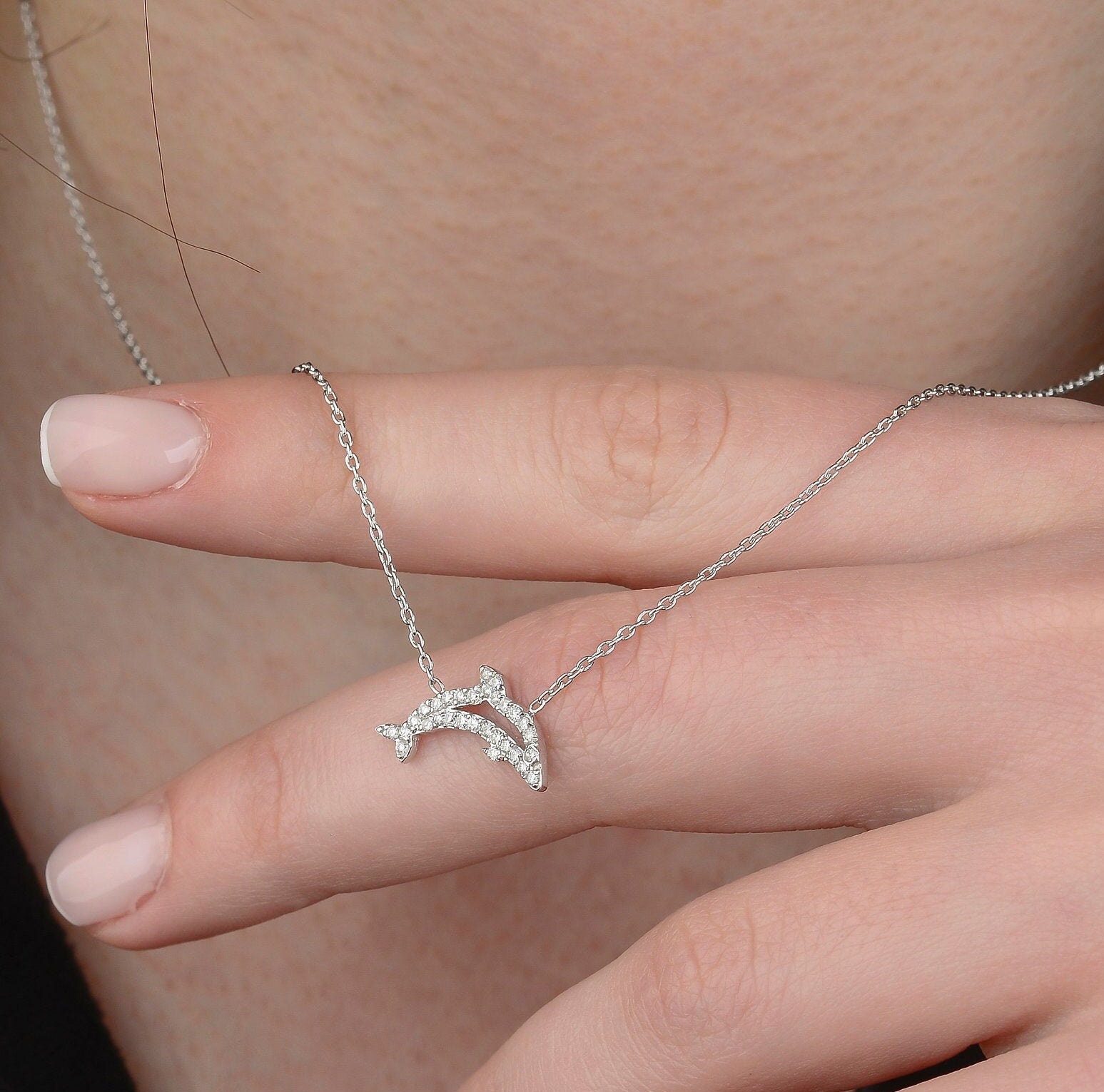 Diamond dolphin pendant deals