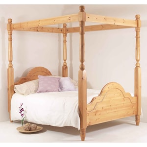 May include: A wooden four-poster bed frame with a headboard and footboard. The bed is made of natural wood and has a simple, elegant design.