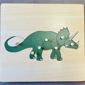 Montessori inspired Triceratops Peg Puzzle