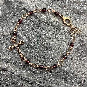 Pulsera Rosario de Bronce y Granate Cruzado