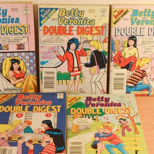 May include: A collection of five vintage comic books featuring Betty and Veronica. The covers are colorful and feature the characters in various scenes. The titles of the comics are "Betty and Veronica Double Digest".