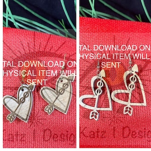May include: A pair of wooden heart-shaped earrings with an arrow design. The earrings are painted in a light wood color with a darker wood accent. The text "Digital Download Only, Physical Item Will Not Be Sent" is visible in the image.