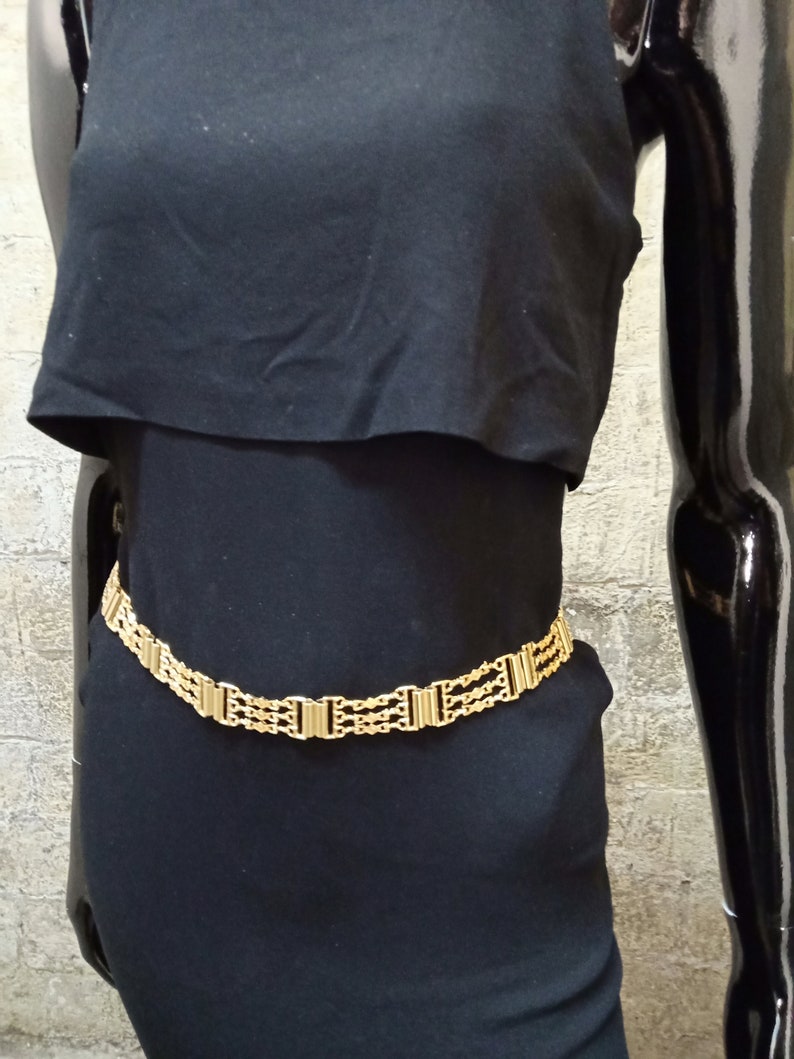 Gold metallic belt. Gold metal belt