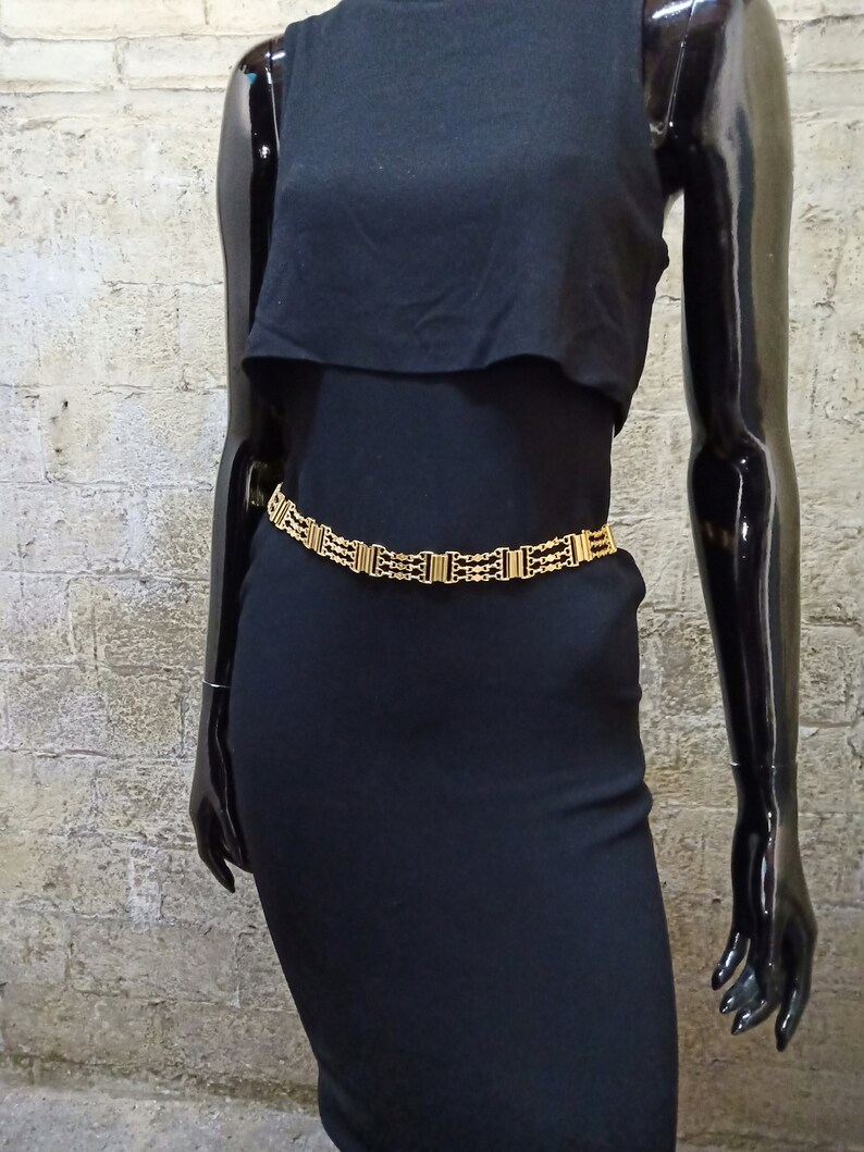 Gold metallic belt. Gold metal belt