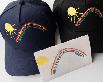 Your child’s drawing on a cap