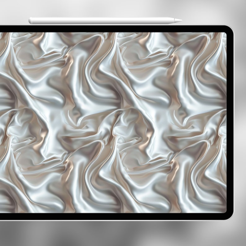 May include: A digital tablet screen displaying a seamless pattern of white and gold satin fabric with a soft, flowing texture.