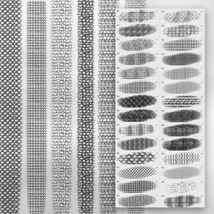 May include: A sheet of paper with 28 different patterns of scales, each labeled with a number. The patterns are drawn in black and white pencil.