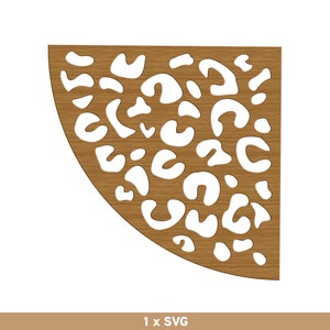 May include: A brown wooden corner shelf with a cut-out design of white leopard spots.
