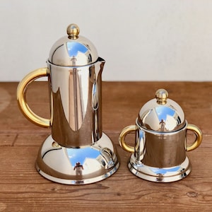Vintage &quot;Orchidea&quot; Coffee Set, 2 Pieces: Sugar Bowl and Coffee Maker (6 cups), in Stainless Steel, Manufactured Inoxpran, 80s, Made in ITALY