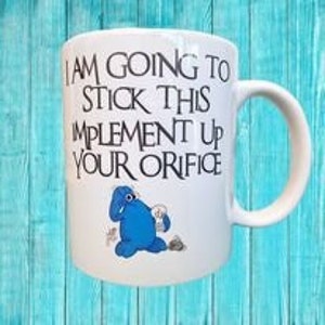 Trapdoor - orifice  MUG