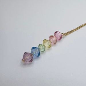 Pastel rainbow crystal sun catcher necklace. Gold stainless steel summer festival jewelry