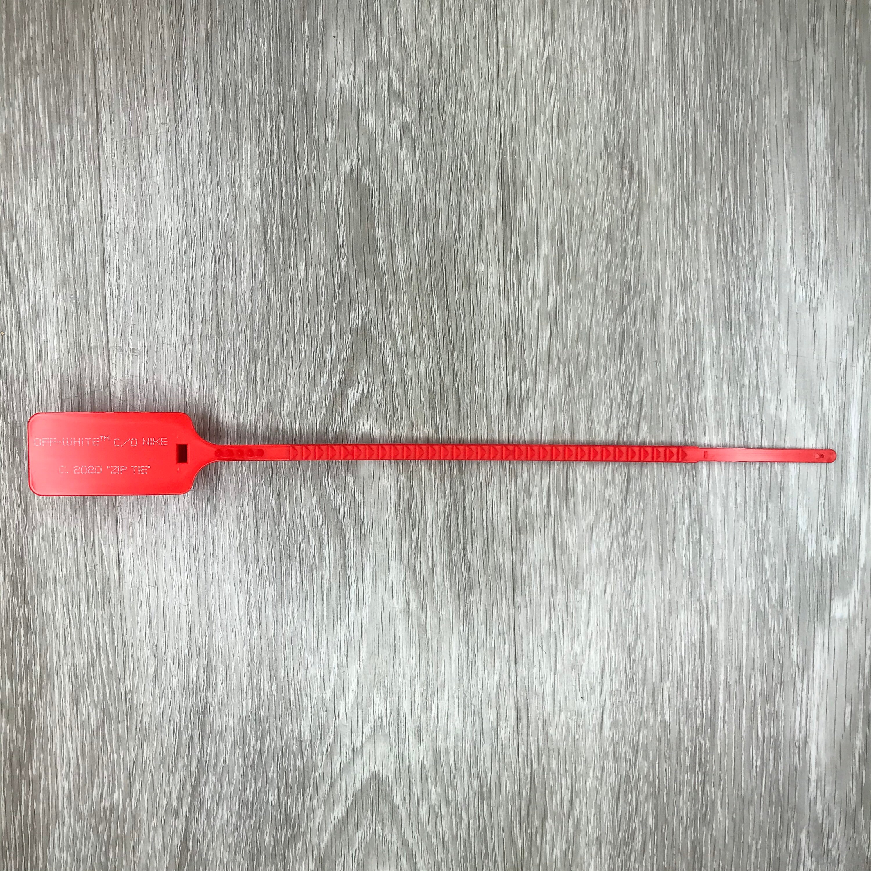 nike off white zip tie