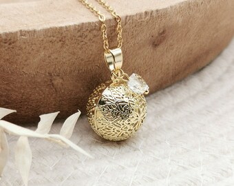 Gold maternity bola with crystal heart